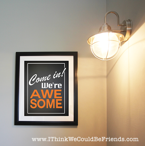 Functional Entryway Makeover with board and batten and dark contrasting doors.