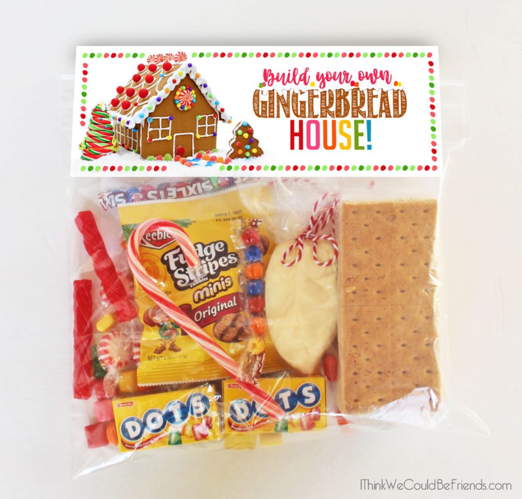 DIY Gingerbread House Kit! Includes decorations, gingerbread house ideas and a free printable topper! Each kit makes to graham cracker gingerbread houses. Host a party or give them out to friends & family! #gingerbread #house #kit #ideas #decorations