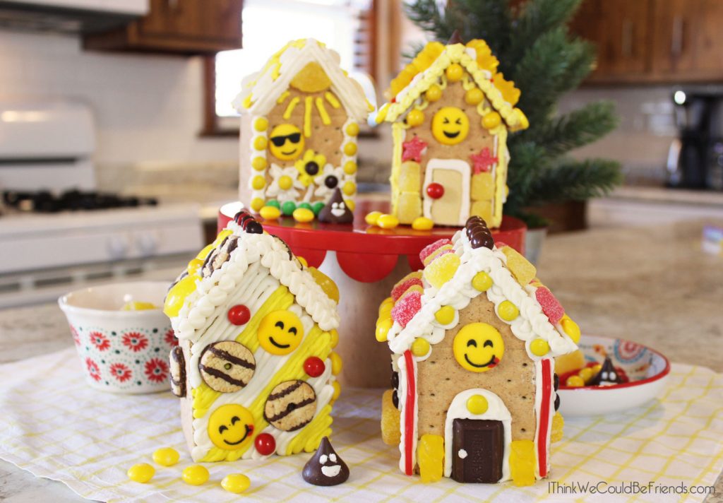 Looking for a fun Emoji Birthday Party idea? Our kids LOVED these Emoji Gingerbread Houses! They are just made from graham crackers and are EASY to make! Also includes a free printable bag topper to make your own Emoji Gingerbread House Build & Decorate kits! #Emoji #Birthday #Party #Ideas #Gingerbread #House #Decorations #Christmas 