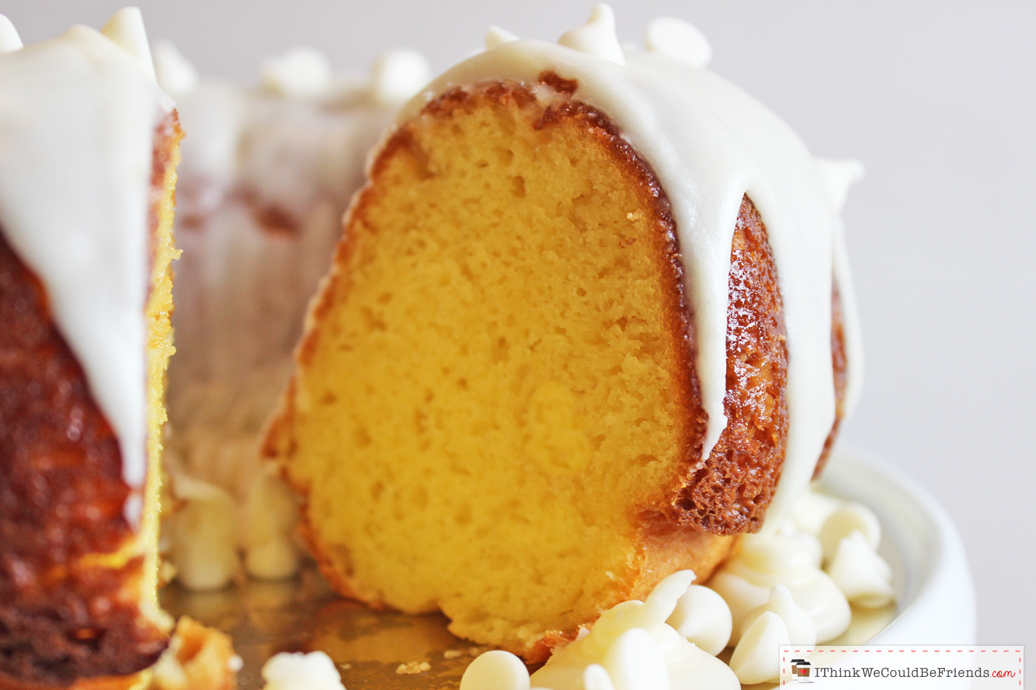 This the BEST & EASIEST White Chocolate Vanilla Bundt Cake recipe that you'll ever try! It starts with a yellow boxed cake mix, BUT then you add sour cream and a pudding mix, it looks FANCY and tastes MOIST and INCREDIBLE! Your guests will rave and will ask for the recipe (so bring copies!) #white #chocolate #vanilla #bundt #cake #recipe #mix #yellow #best #easy #quick #moist