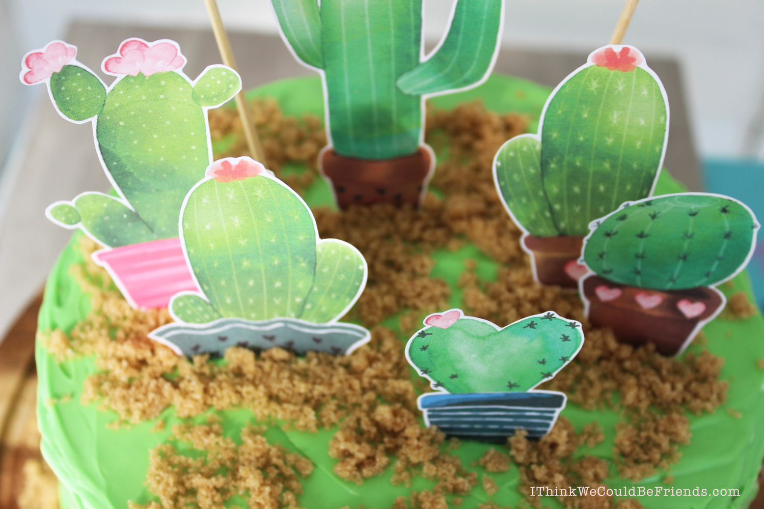 This Mother's Day Cactus Cake Topper is super EASY to make and FREE! What mom doesn't love that? You can put it on a homemade cake or store bought, just print, cut out the shapes, hot glue to skewer sticks and decorate! #mothers #day #cake #diy #decoration #topper #free #printable #cactus #succulent #easy