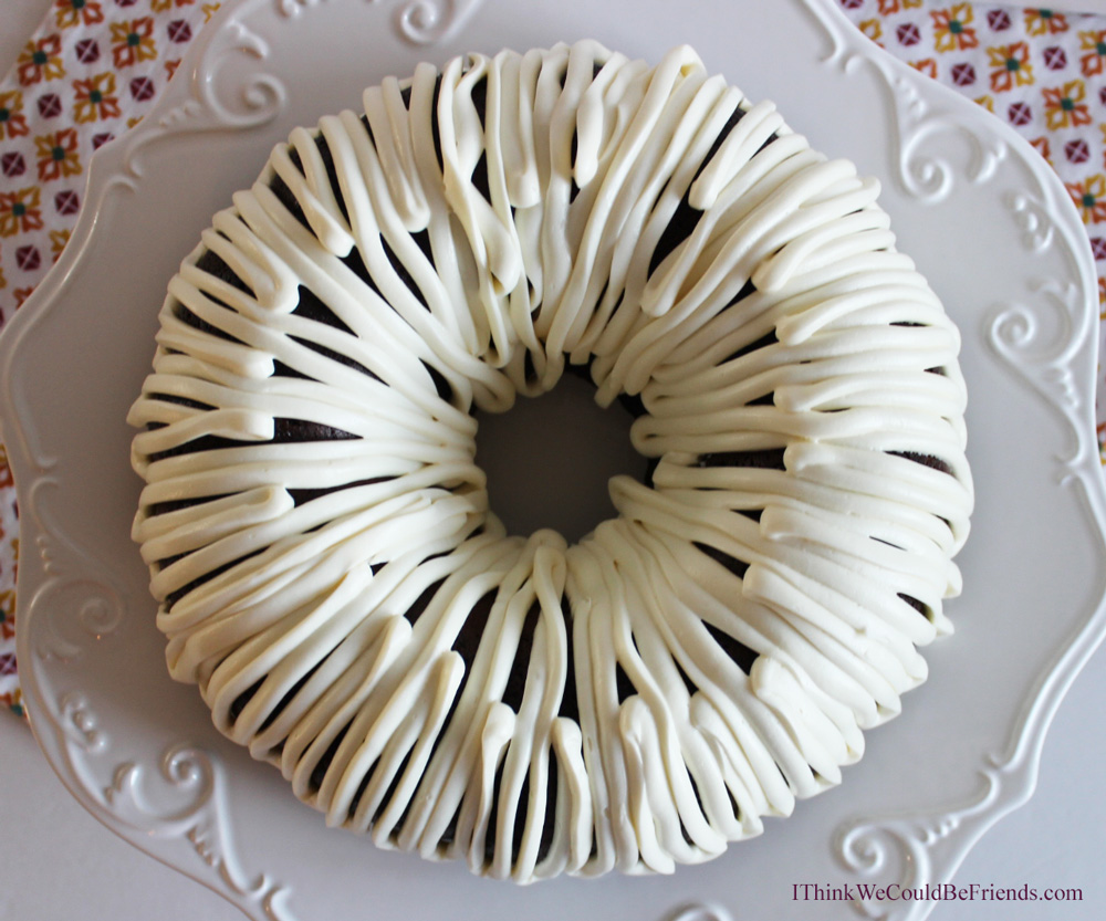 Awesome and EASY Chocolate Sour Cream Bundt Cake Recipe starts from a box cake mix but then you add sour cream and pudding and it is incredibly MOIST!!!! Mixes up in 5 minutes but tastes like it is from a fancy bakery! Your guests will RAVE!! #chocolate #bundt #cake #recipe #easy #awesome #moist #mix #frombox