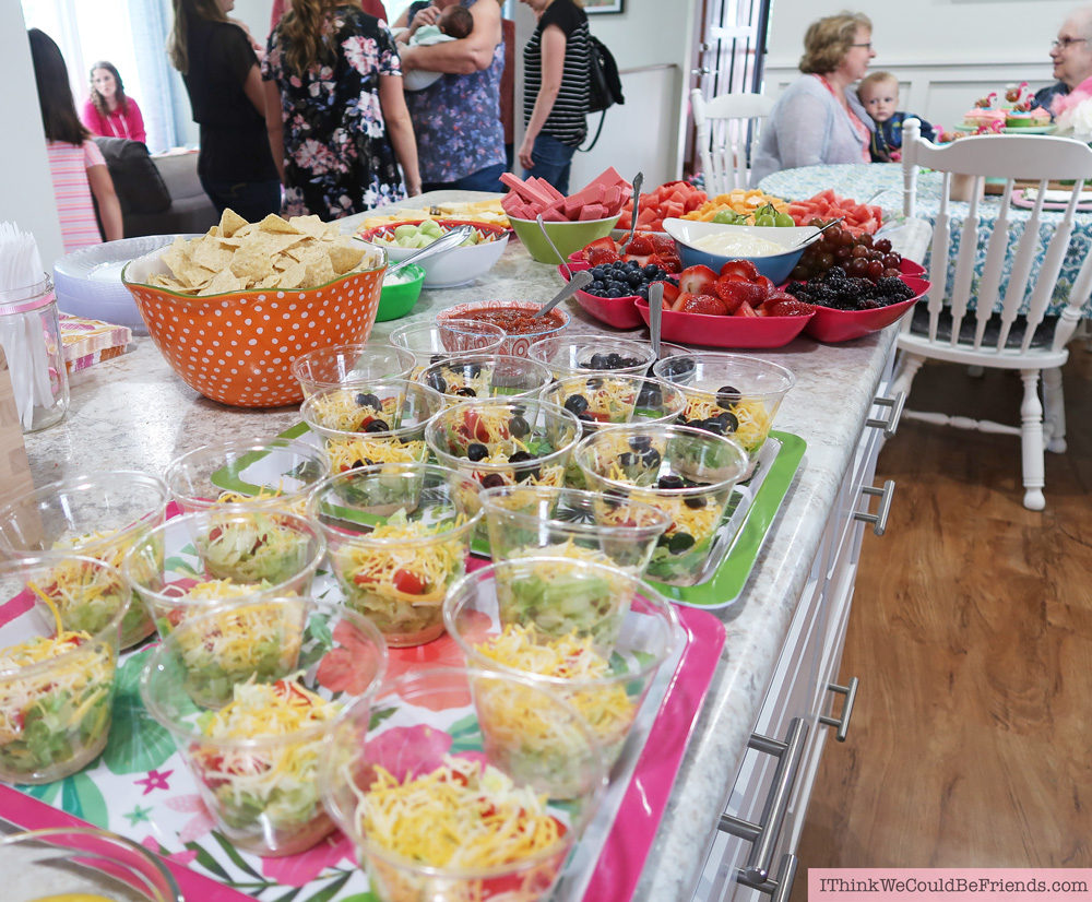 Cheap but TASTEFUL Flamingo Party Decoration Ideas, using ALL items from the Dollar Tree! We hosted a beautiful Flamingo Baby Shower for my sister that didn't break the bank!!! Everyone LOVED the flamingo theme and especially the DIY Tropical Balloon Garland, flamingo cupcake topper and a FREE printable! #flamingo #party #decoration #ideas #cupcake #topper #free #printable #cheap #easy #baby #shower #bridal #kids